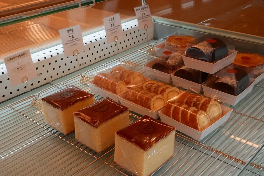 Bakery items and desserts displayed in the center of the café