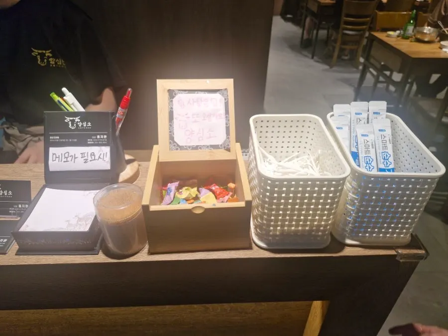 Candy, floss, and mouthwash corner next to the register