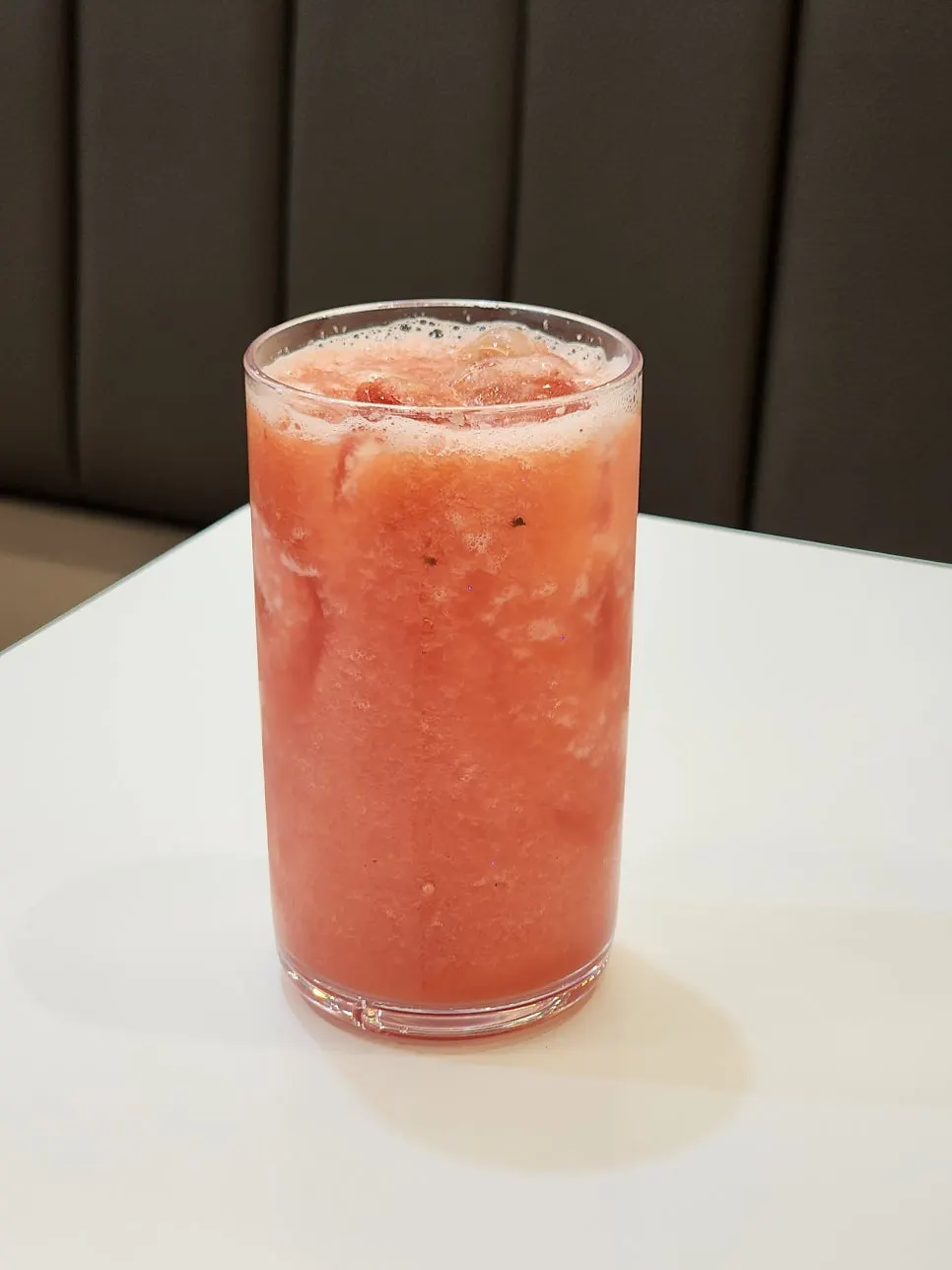 Table enjoying watermelon juice with bread