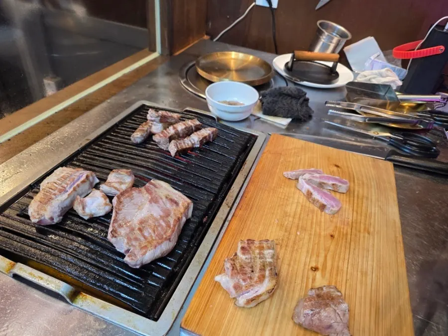Charcoal-seared meat table setting
