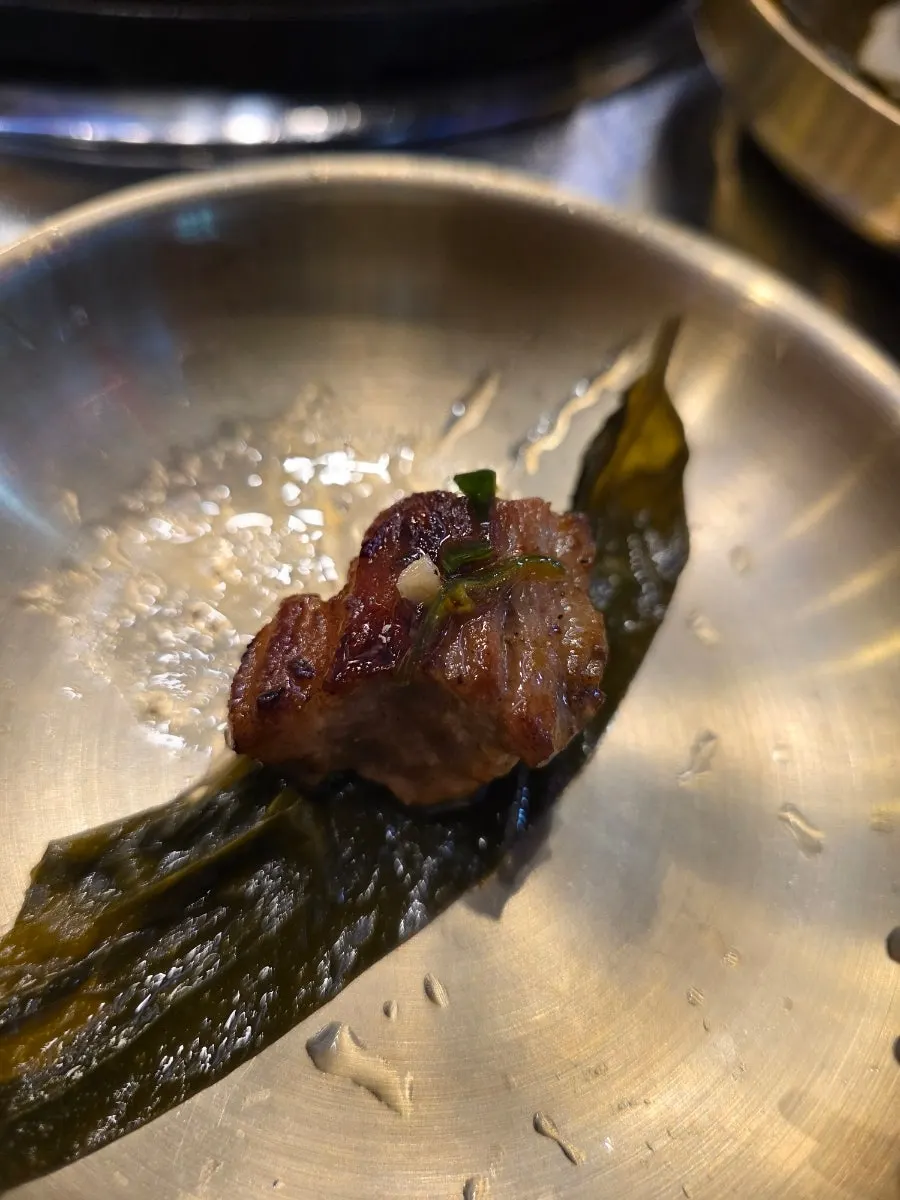 Pork neck and seasoned sauce