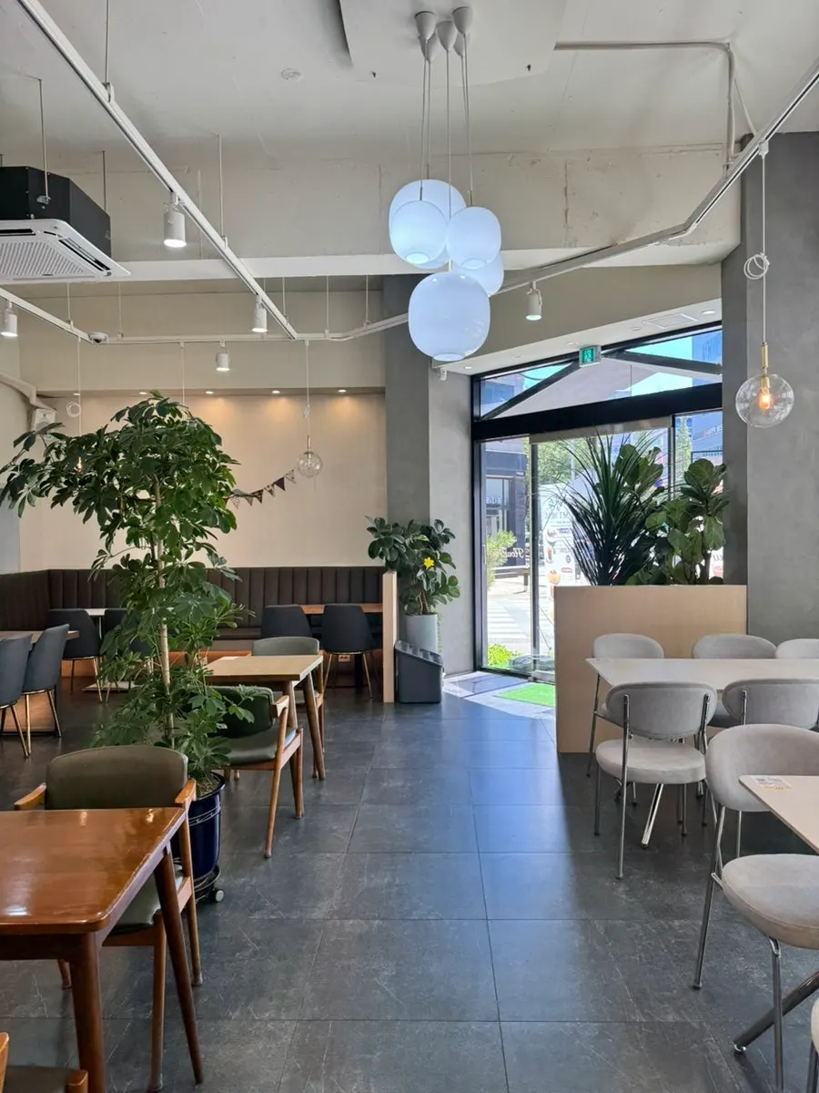 Wide view of interior seating at Flowerpot Cafe