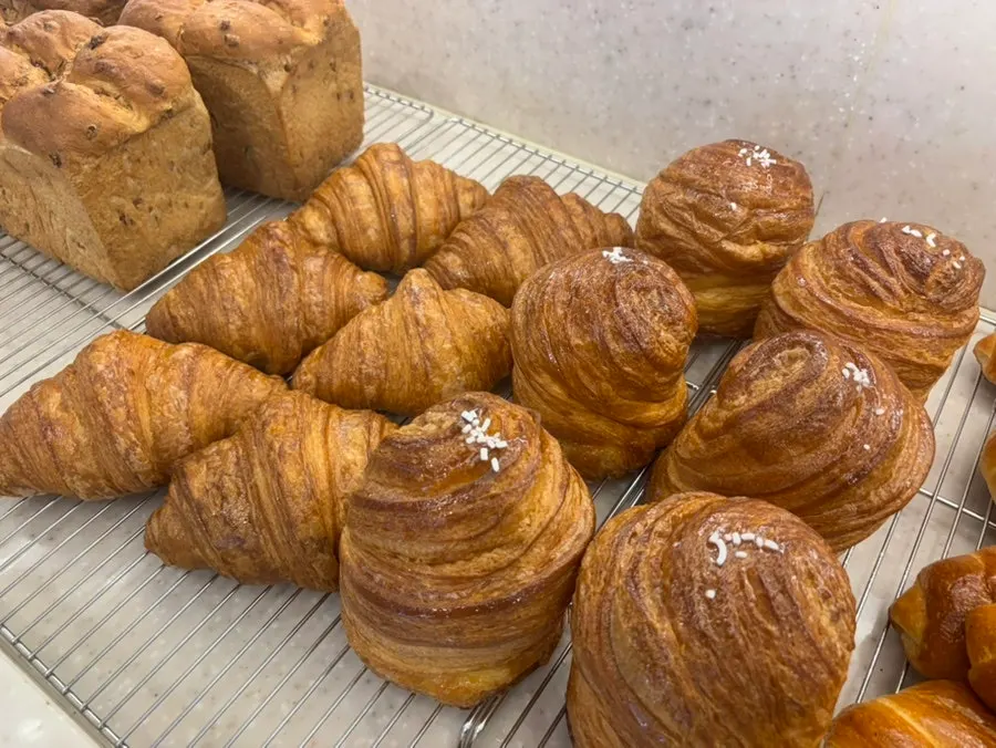 Croissant and walnut cream cheese bread display shelf