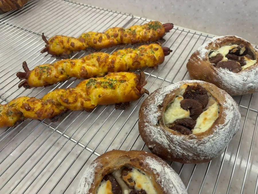 Fig campagne and long sausage bread on display