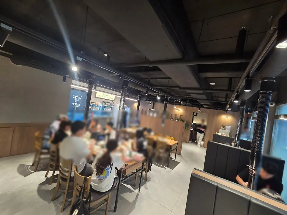 Interior of the Korean BBQ restaurant packed with customers