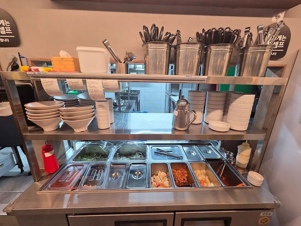 Self-serve bar with vegetables and side dishes