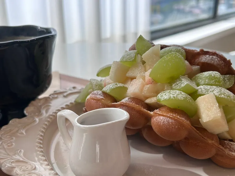 Seasonal fruit Hong Kong waffle with two hot Americanos
