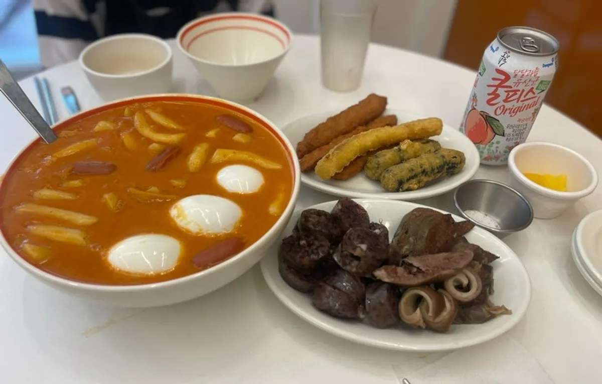 Tteokbokki, fried snacks, and sundae all served together in the set