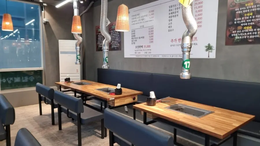 Restaurant seating extending into the back