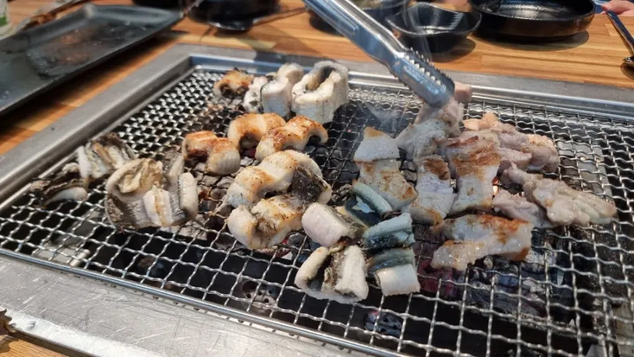 Grilled eel turning golden brown