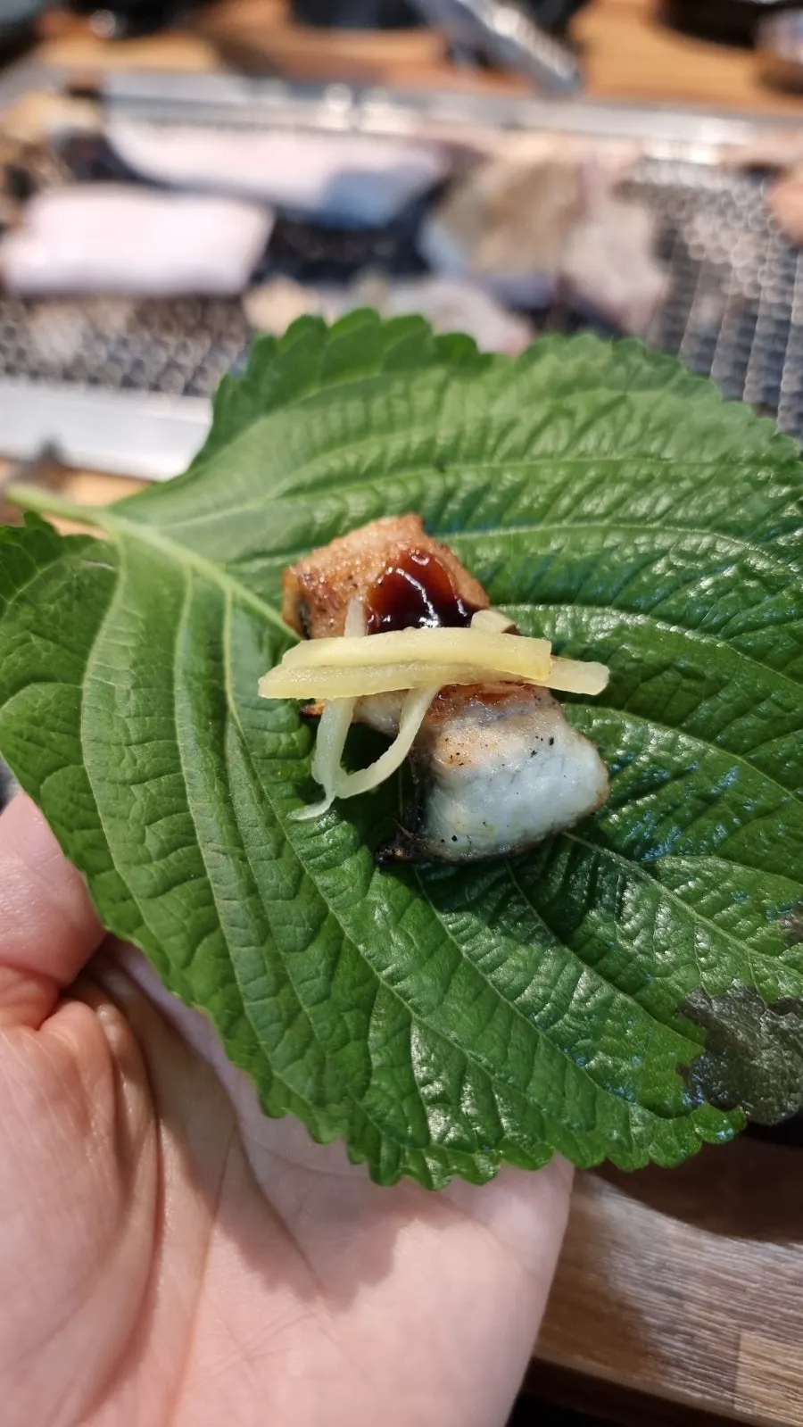 Grilled eel plated with side dishes