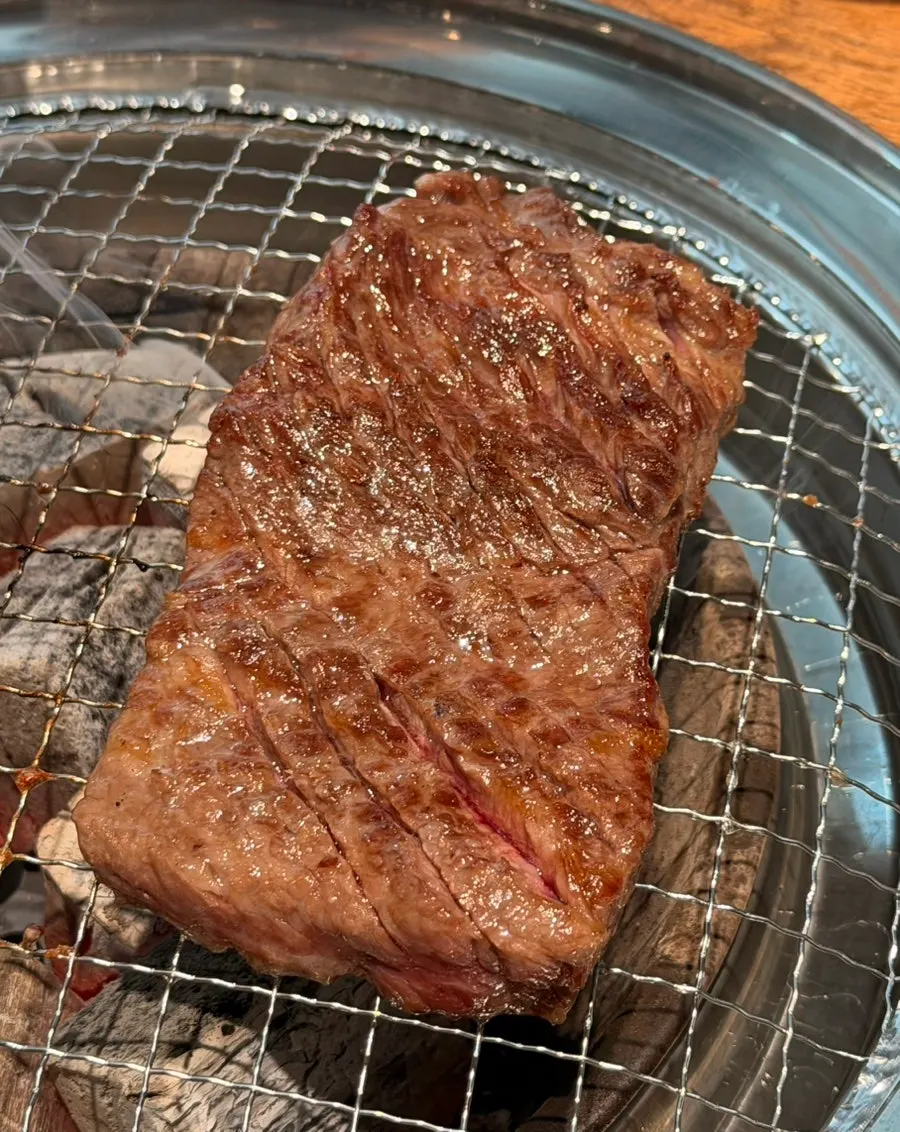 Flower ribs grilling over charcoal