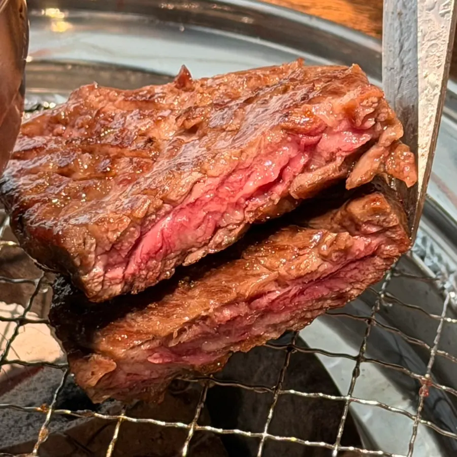 Flower ribs cooking over charcoal