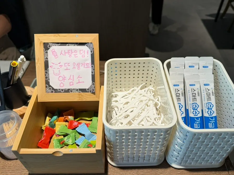 Station with candy, floss, and mouthwash