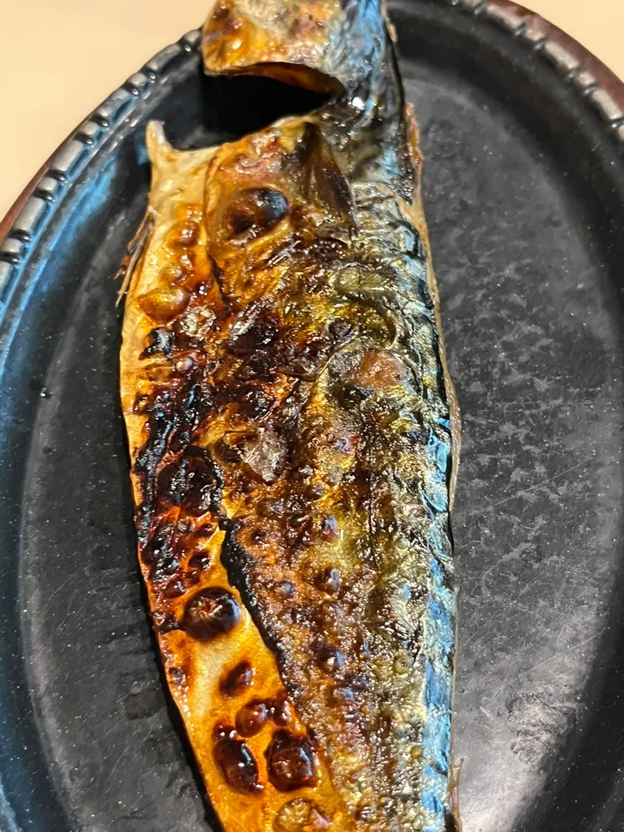 Golden-brown grilled mackerel