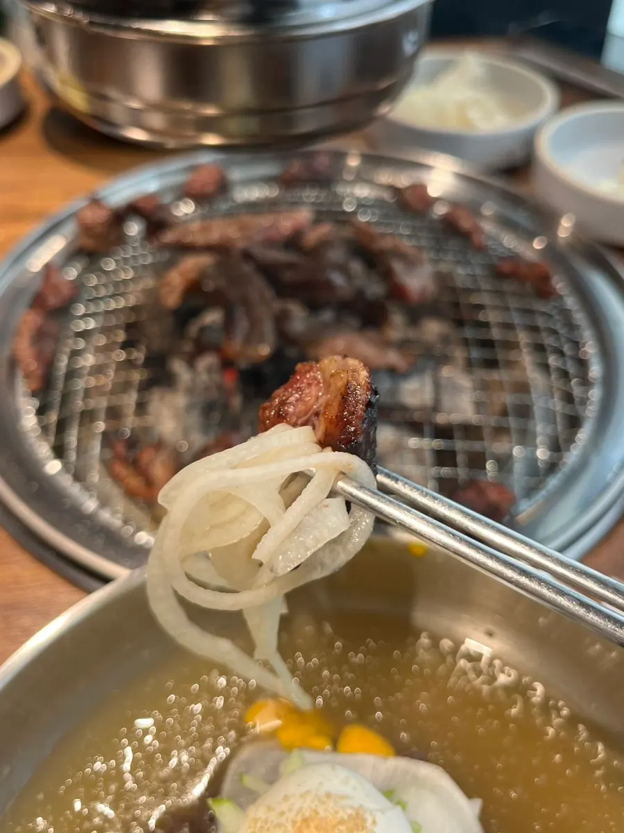 Beef rib meat with side dishes and sauce