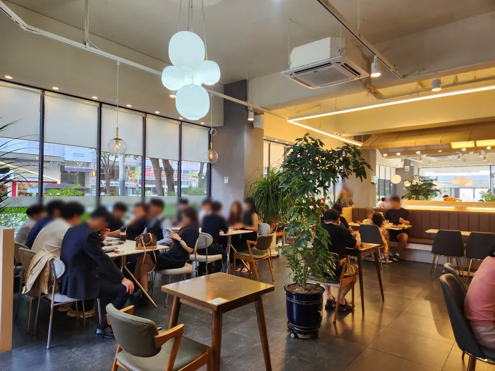 Café seating area with sofas and outlets