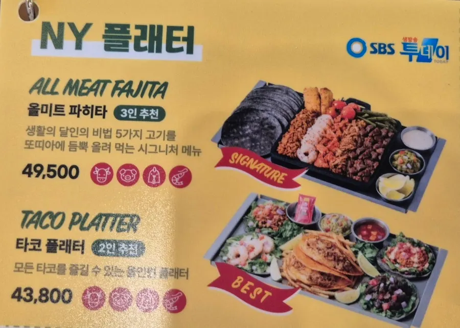 Menu board with nachos and fajitas