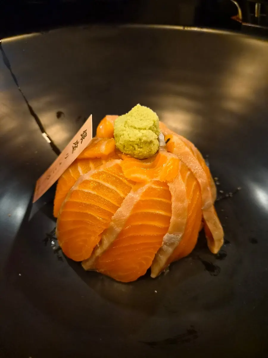 Salmon rice bowl served in a large bowl