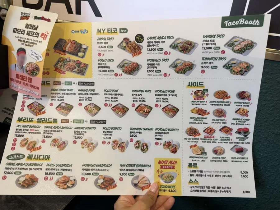 Menu listing tacos and burritos
