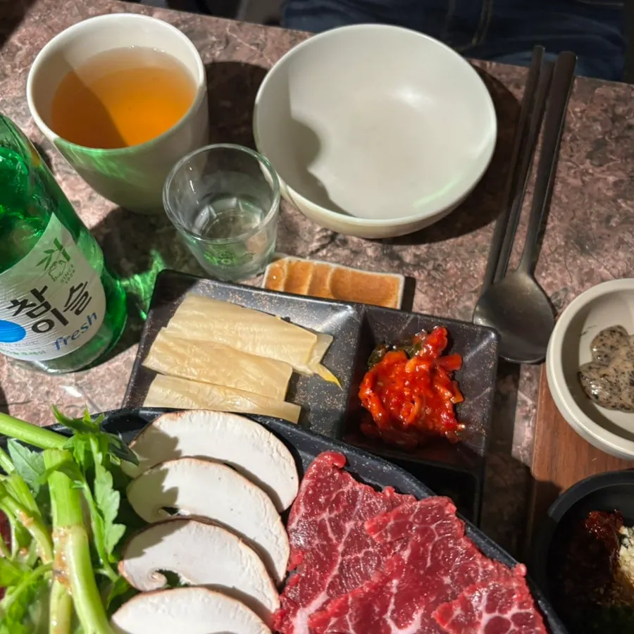 A bite combining meat with a side pairing