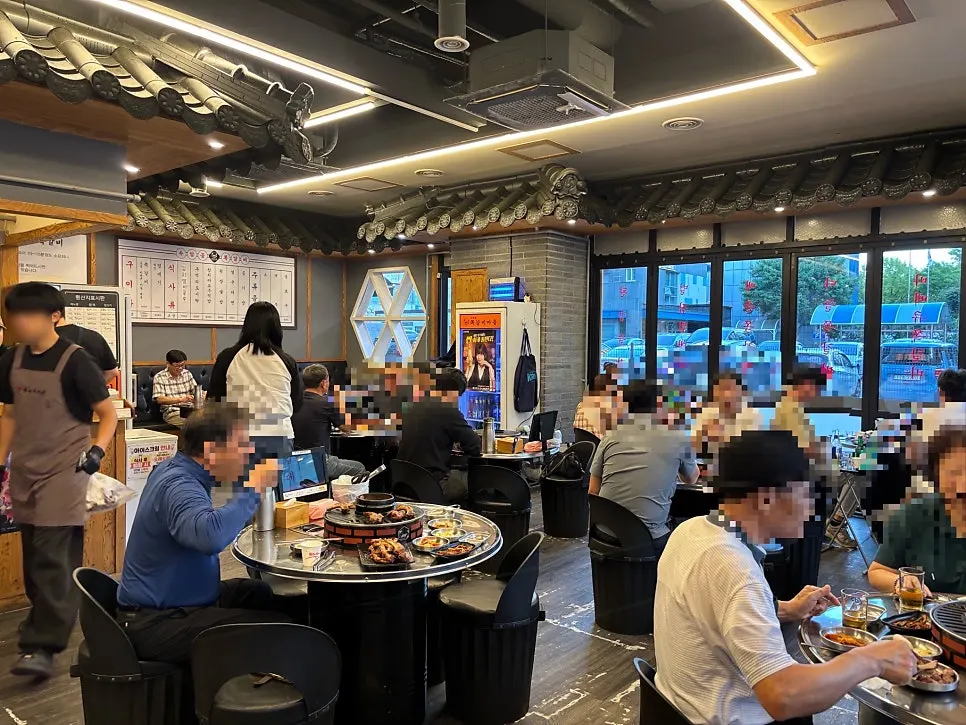 Spacious interior with folding doors and tables