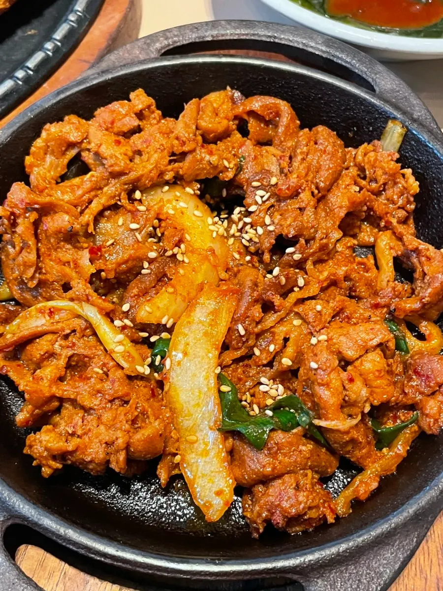 Plate of well-seasoned spicy pork stir-fry