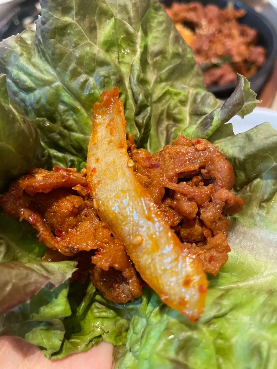 Spicy pork stir-fry served alongside rice