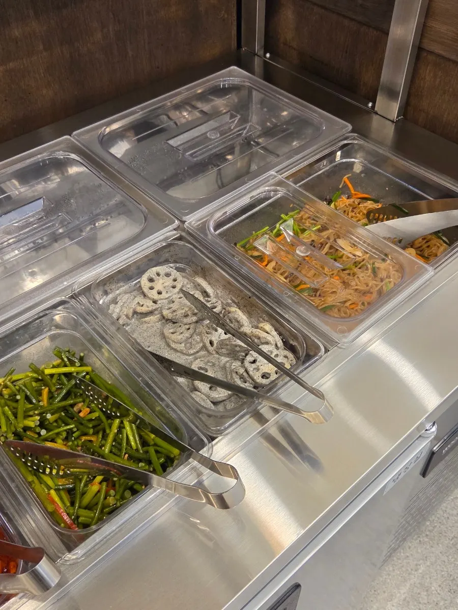 Self-serve bar prepared with a variety of side dishes