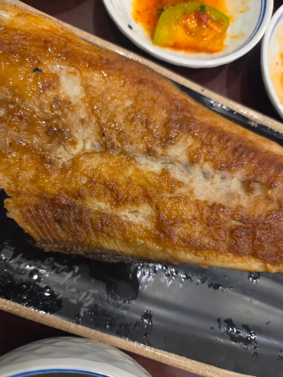 Large, thick grilled Spanish mackerel