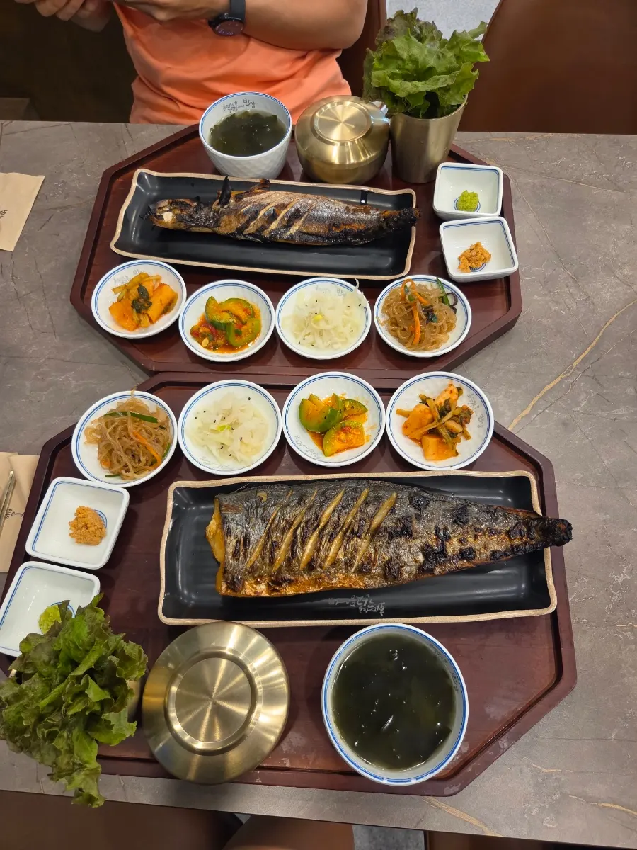 Light miyeokguk served alongside grilled fish