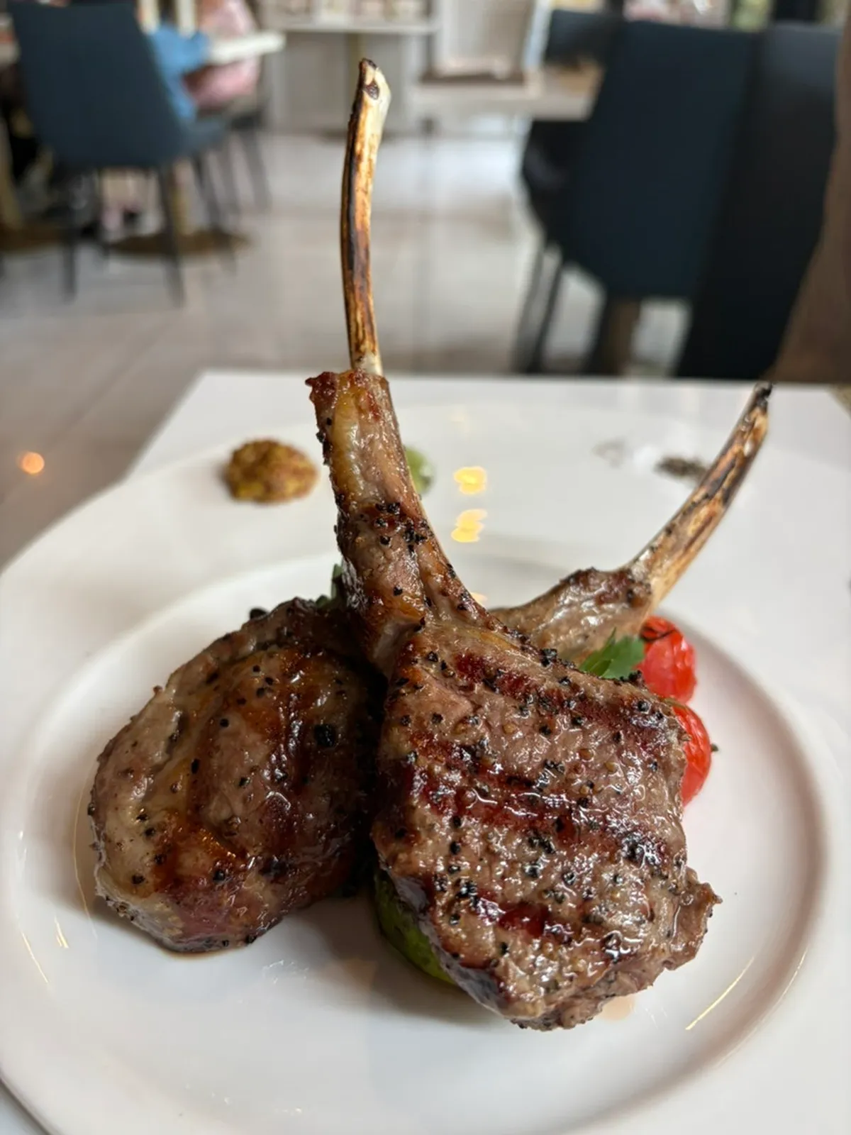 Lamb chop steak served with dipping sauces