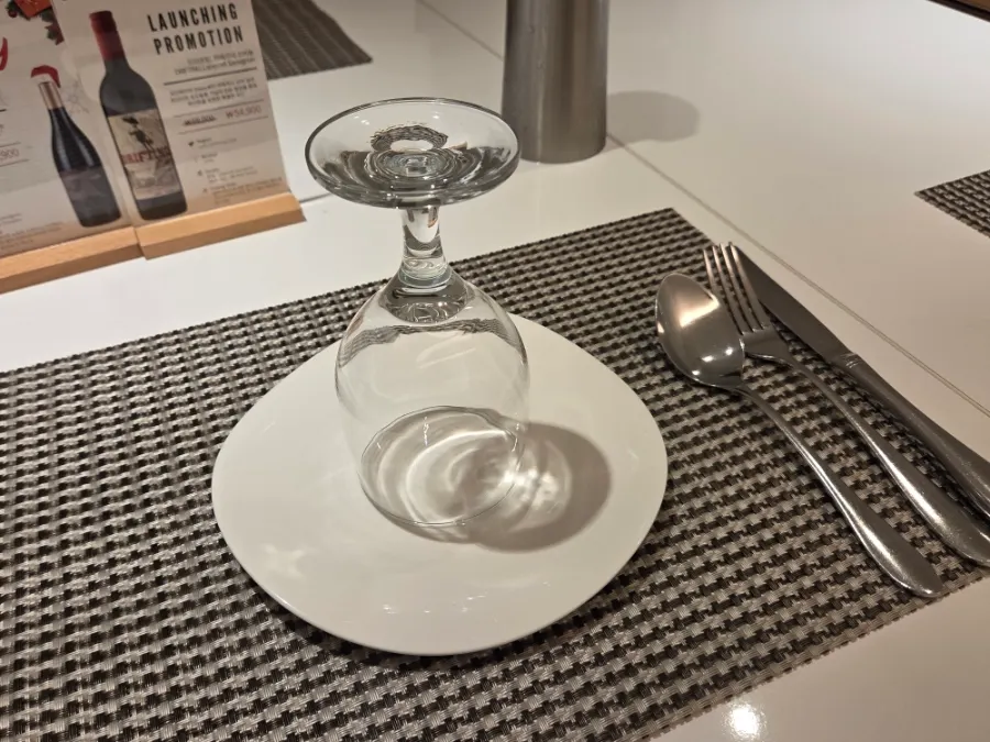 Table set with wine glasses and cutlery