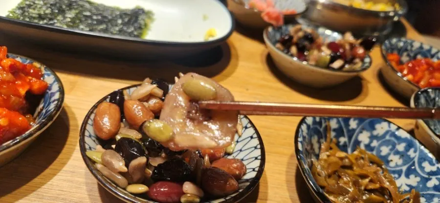 Abalone pot rice and banchan side dishes