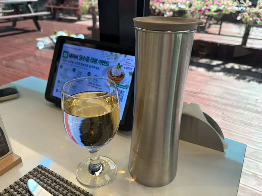 Water served at the restaurant with a savory roasted flavor