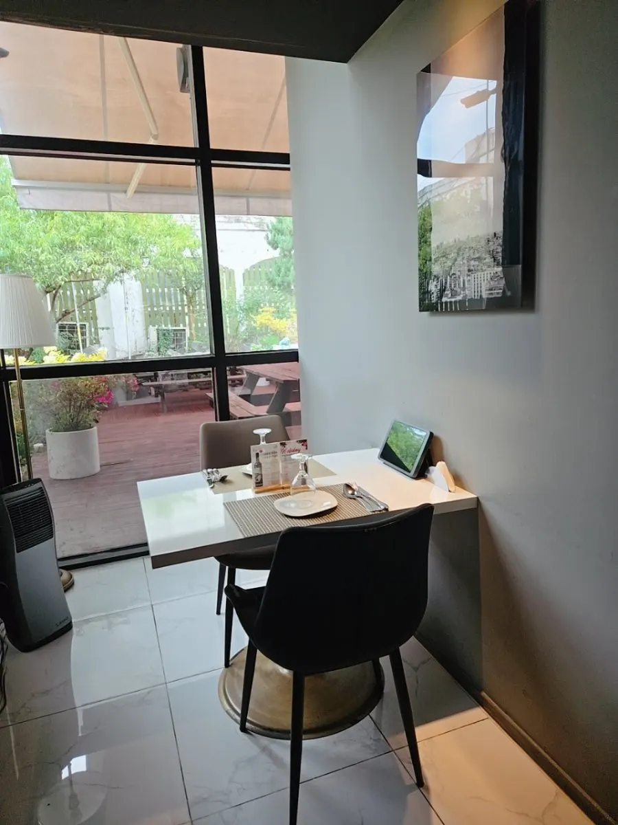 Interior with generously spaced tables