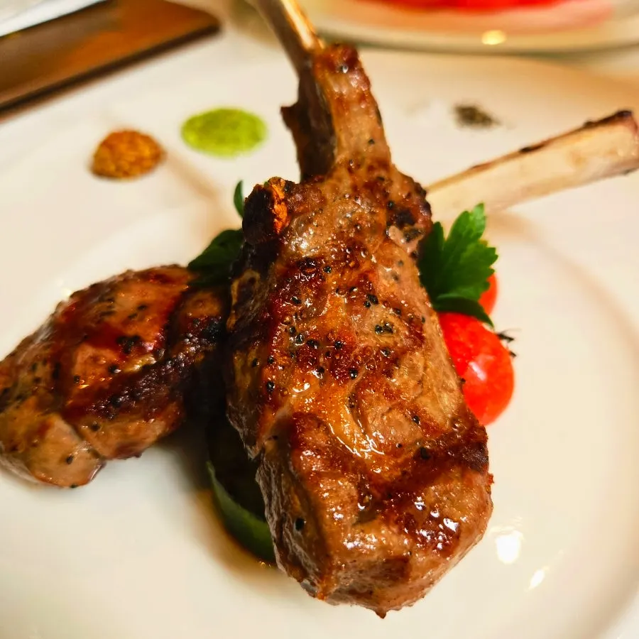Lamb chop steak with five sauces and grilled vegetables