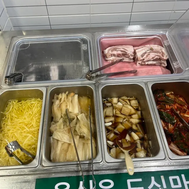 Self-serve bar with vegetables and wraps