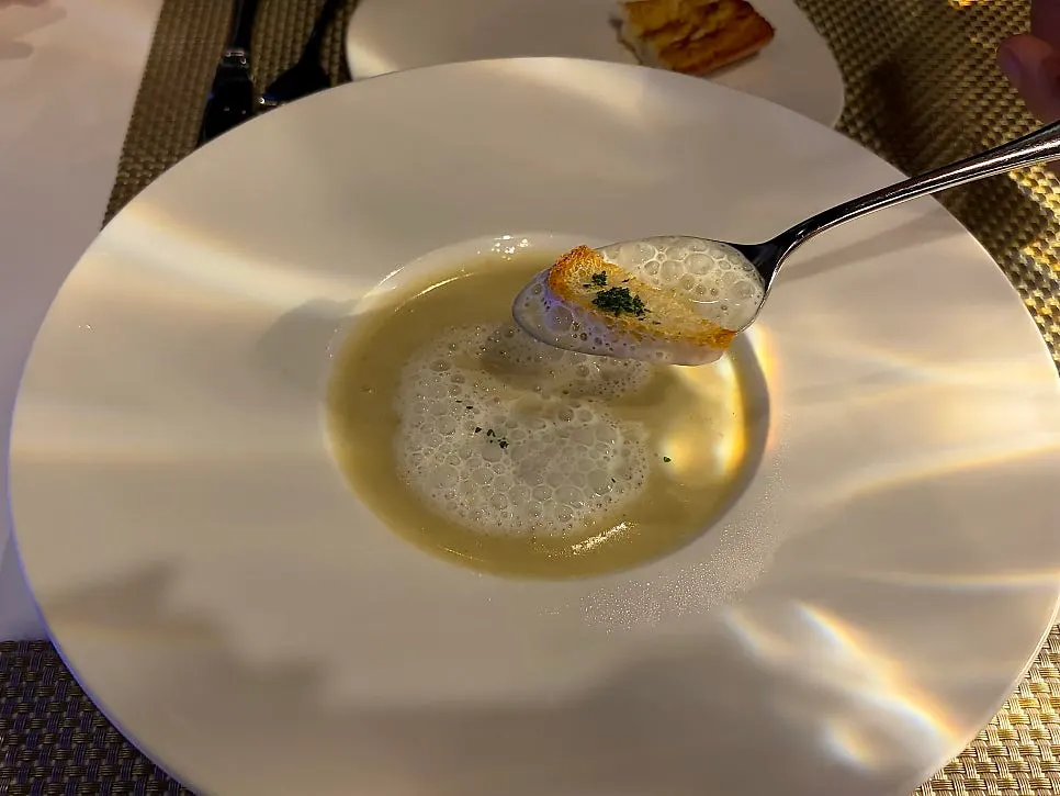 A bowl of rich, thick potato cream soup
