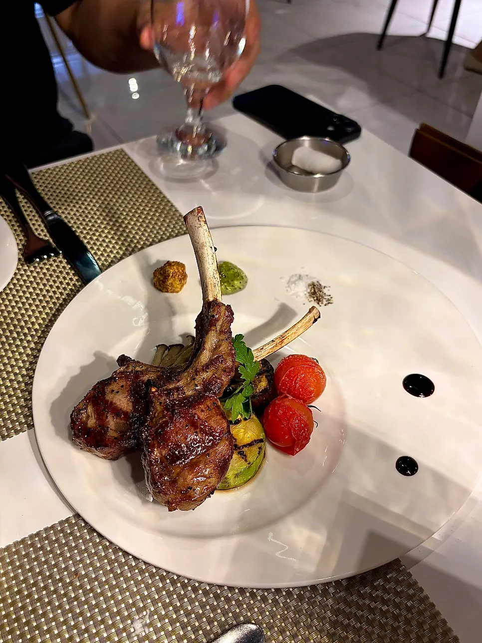Lamb rack steak plated and served