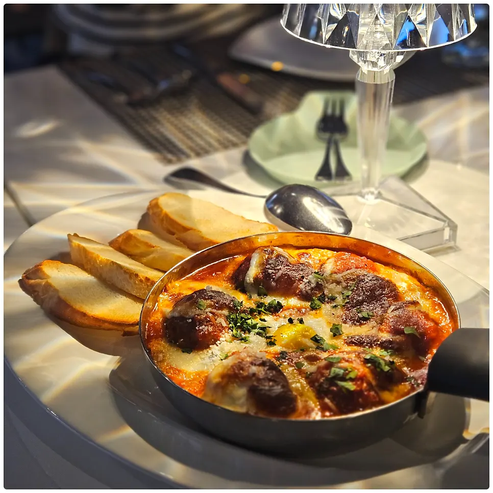 A bowl of handmade meatball gratin