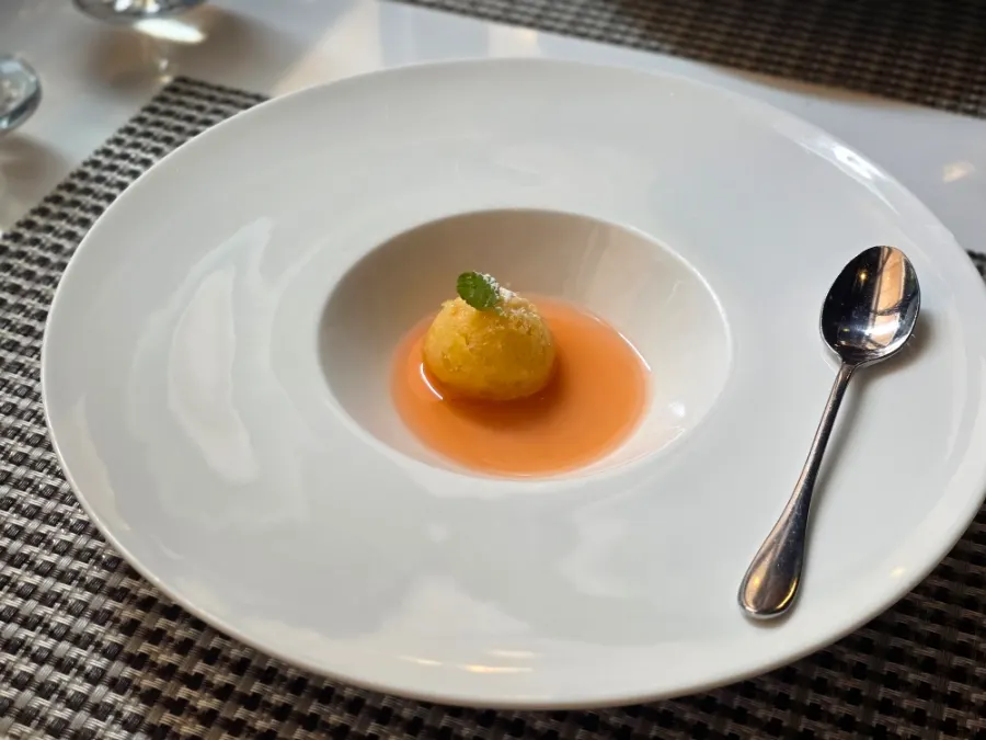 Peach sherbet served as dessert after the meal
