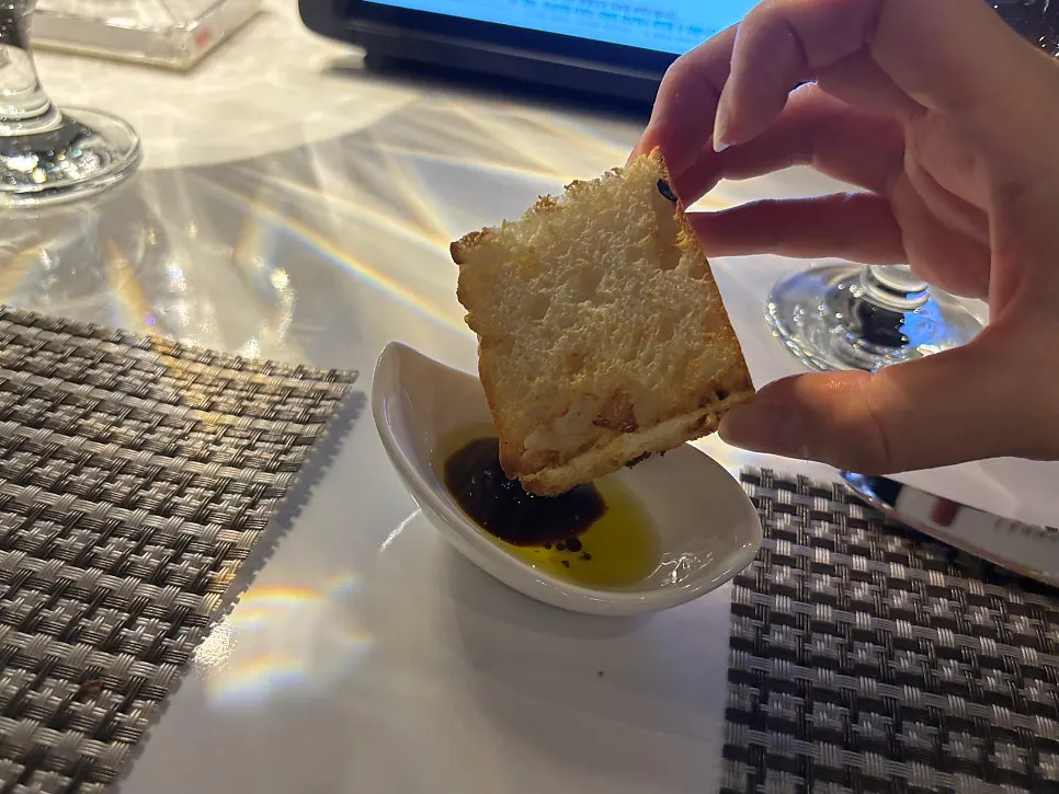 Warm bread served with olive oil and balsamic sauce