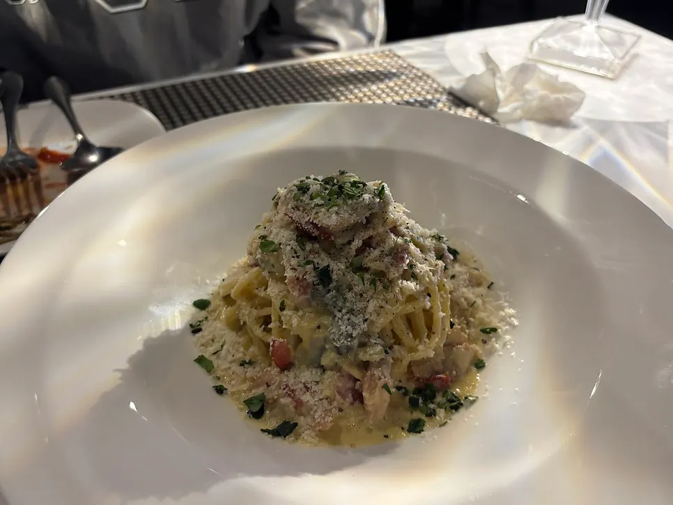 Plate of carbonara with thick cream sauce