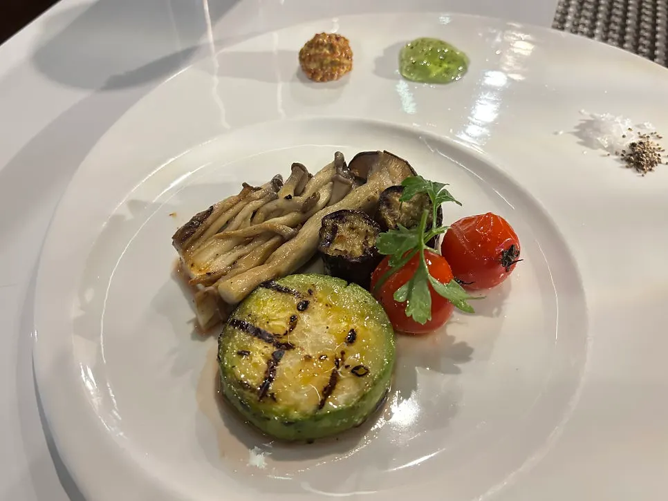 Grilled zucchini, mushroom, and tomato garnish