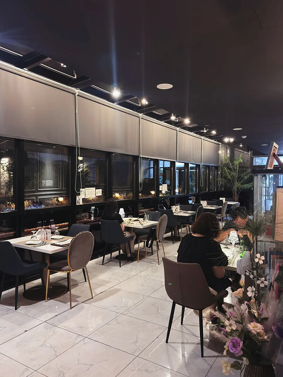 Restaurant interior in white and gray tones