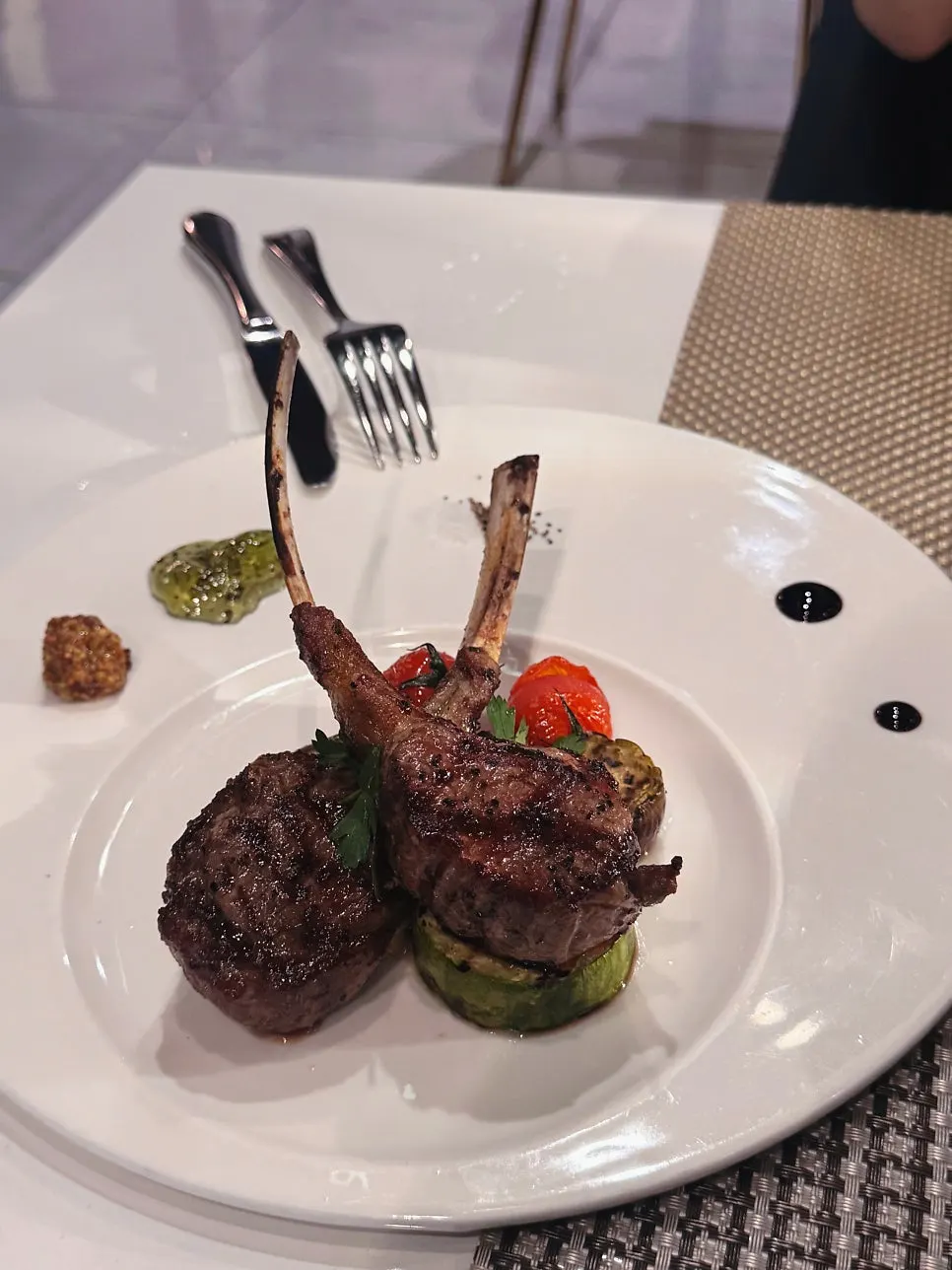 Lamb chops sliced and eaten piece by piece