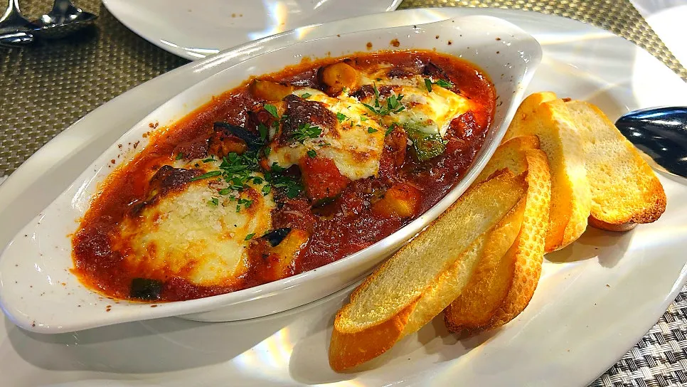 Wild Tongyeong stone octopus ratatouille gratin topped with cheese