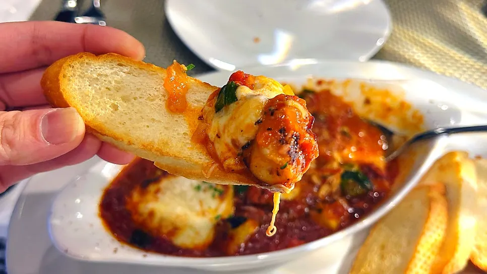 Octopus ratatouille piled onto bread