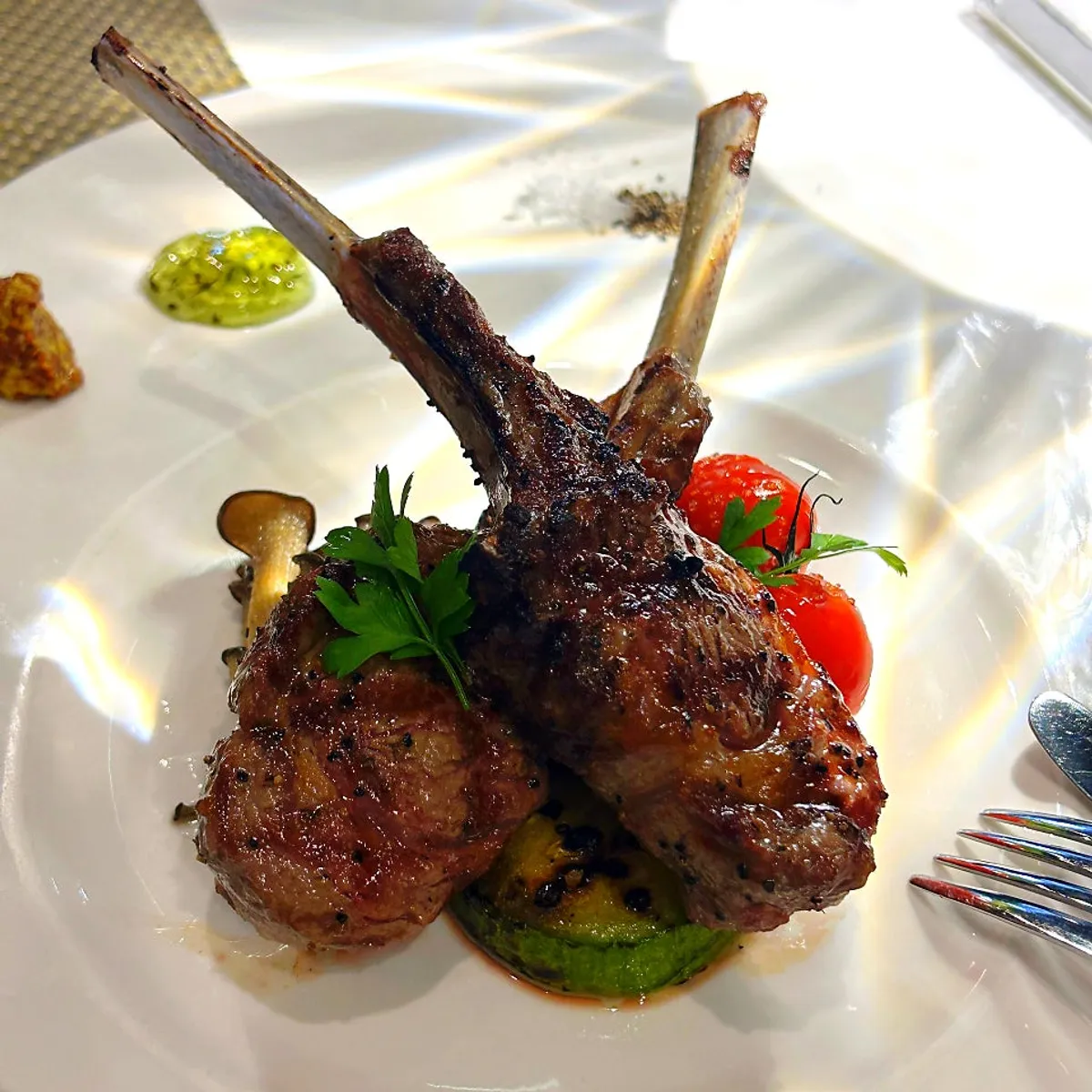 Lamb chop steak plated with grilled vegetables
